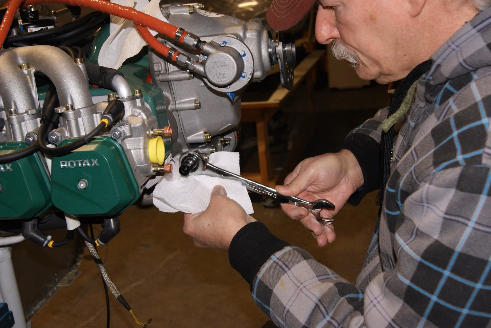 What caused damage to the Rotax 912 engine?