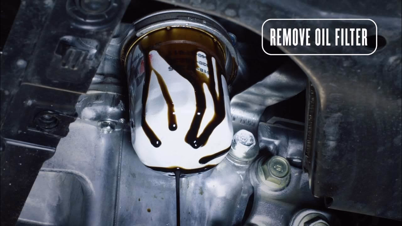 How do you change engine oil in a Honda City saloon?