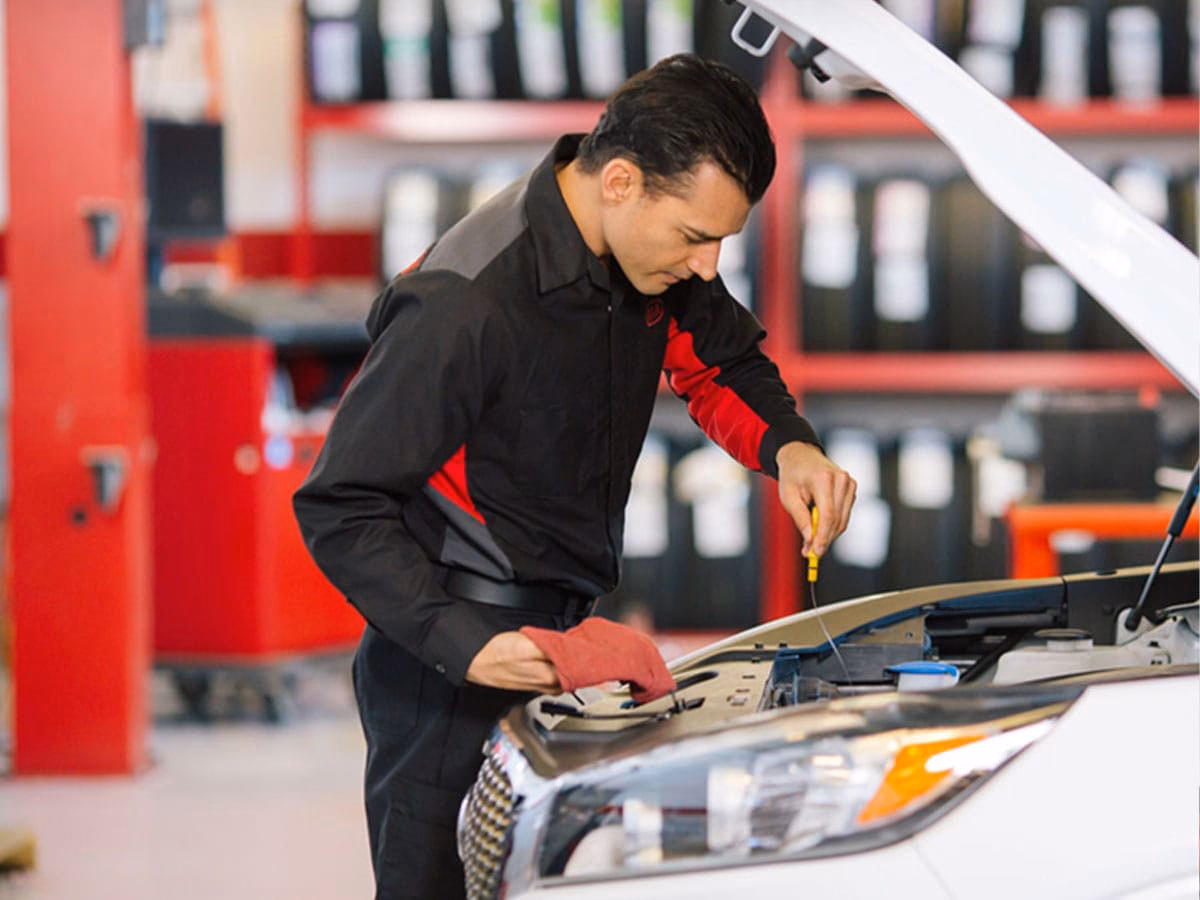 How to drain and replace engine oil in a KIA vehicle?