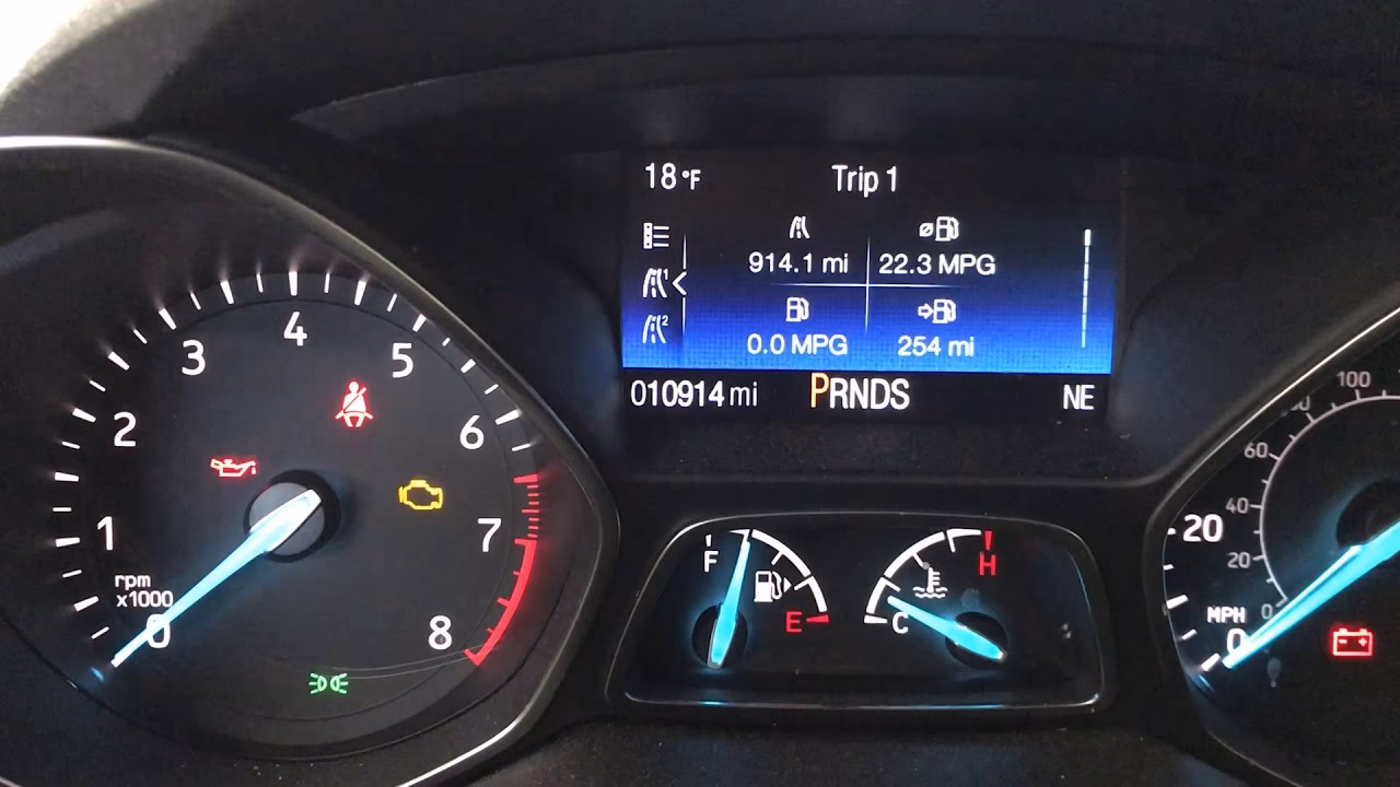 How to reset the oil service light in a Ford Escape?