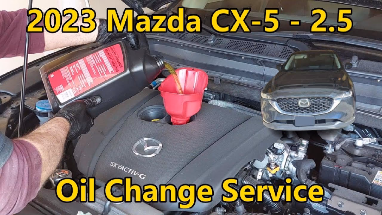 How to fill up the engine with oil in a Mazda CX-5?