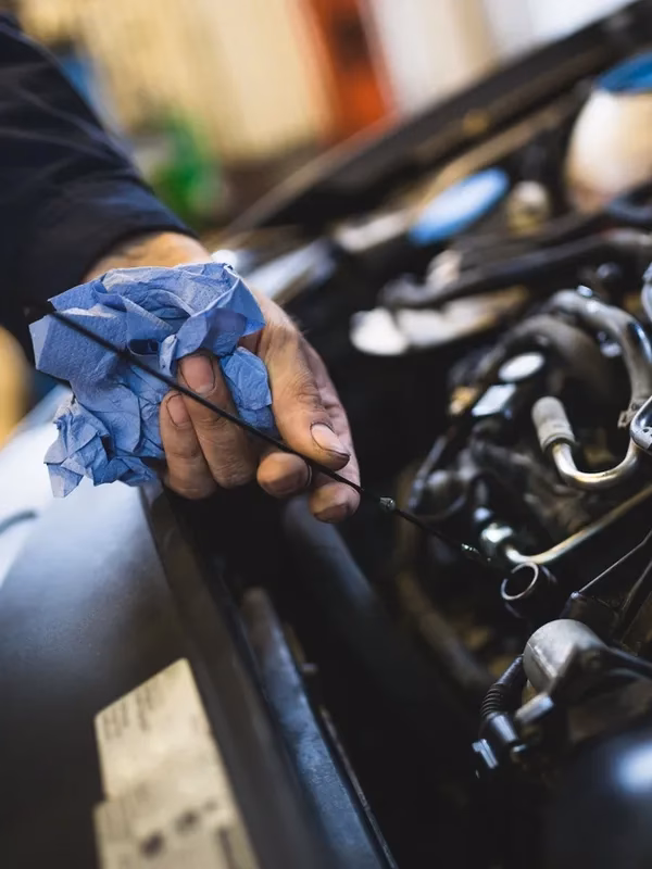 Does Mike's garage offer a free oil change?