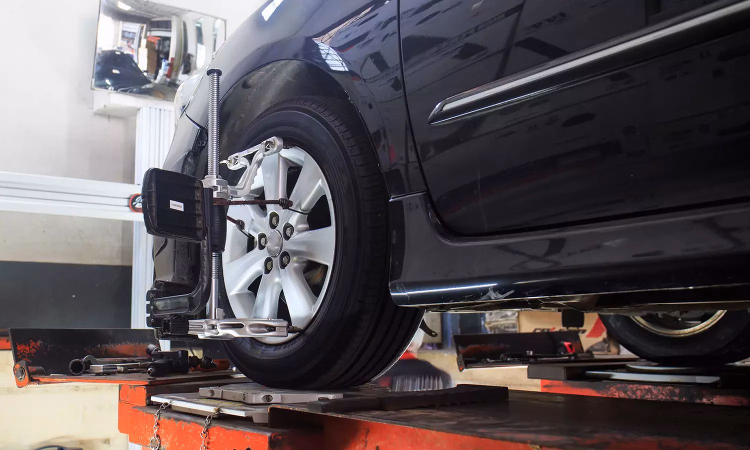 How does a wheel alignment work at OK tire?