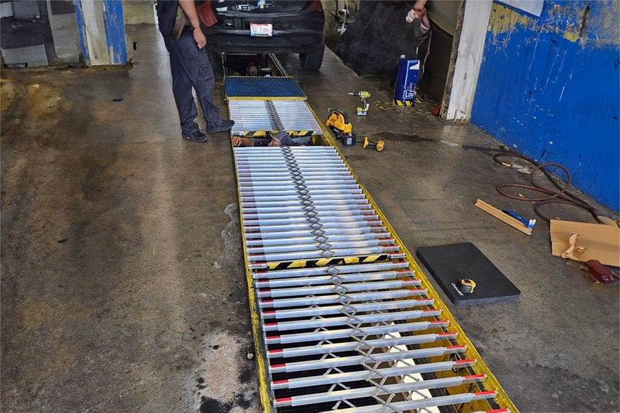 Does OSHA require guardrails around service pits?