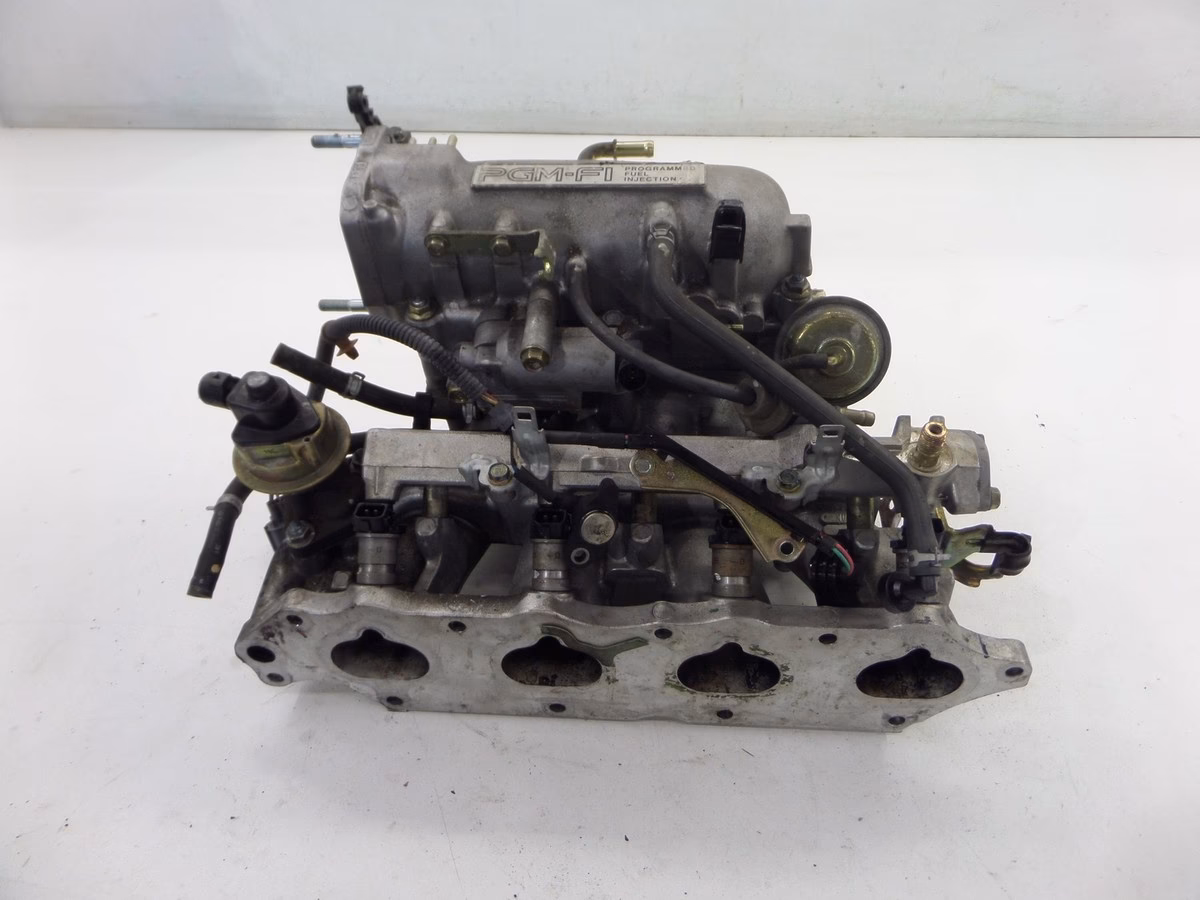 What is a programmed fuel injection system?