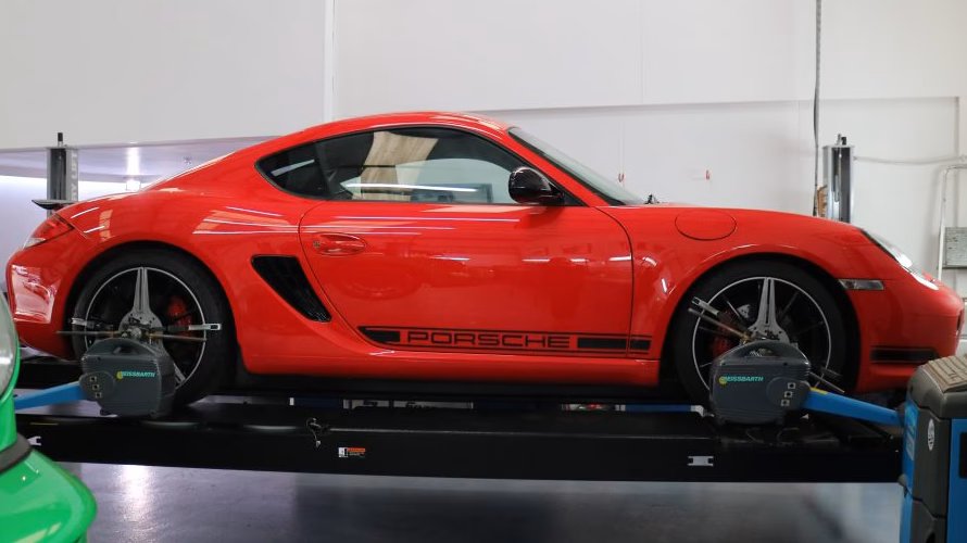Does Revolution Porsche have a four wheel alignment system?
