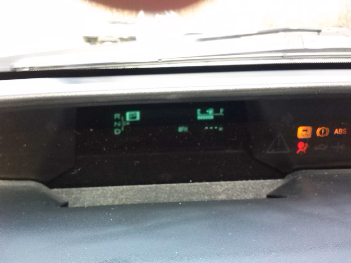 How do I Reset my Toyota Prius oil maintenance required reminder?