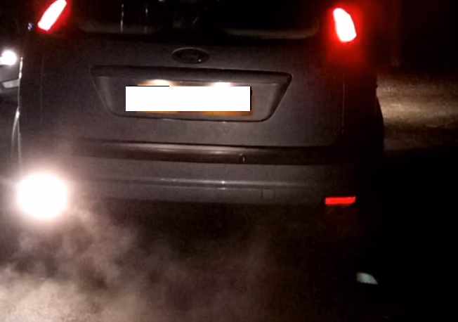 What is a defect in a front or rear fog lamp?