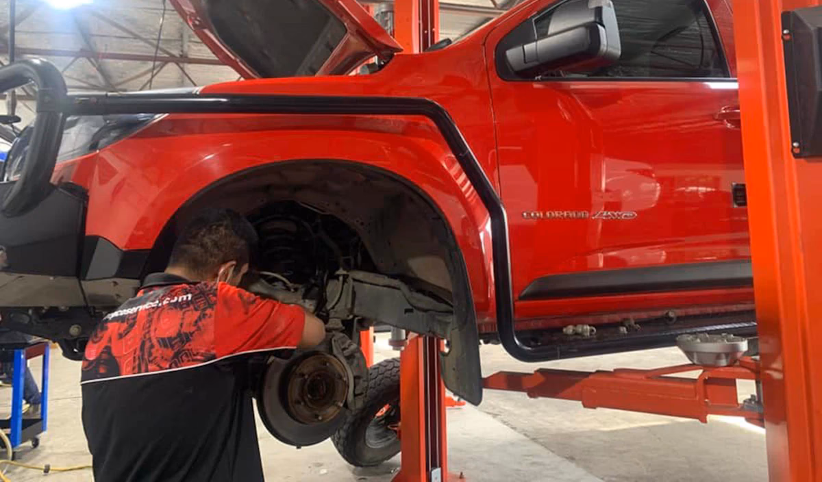 Can Tassie automotive service a new car?