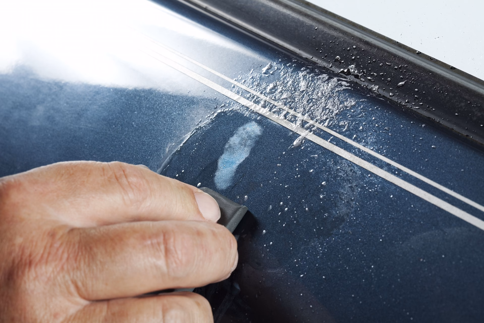 Can a car touch up pen fix scratched paint?