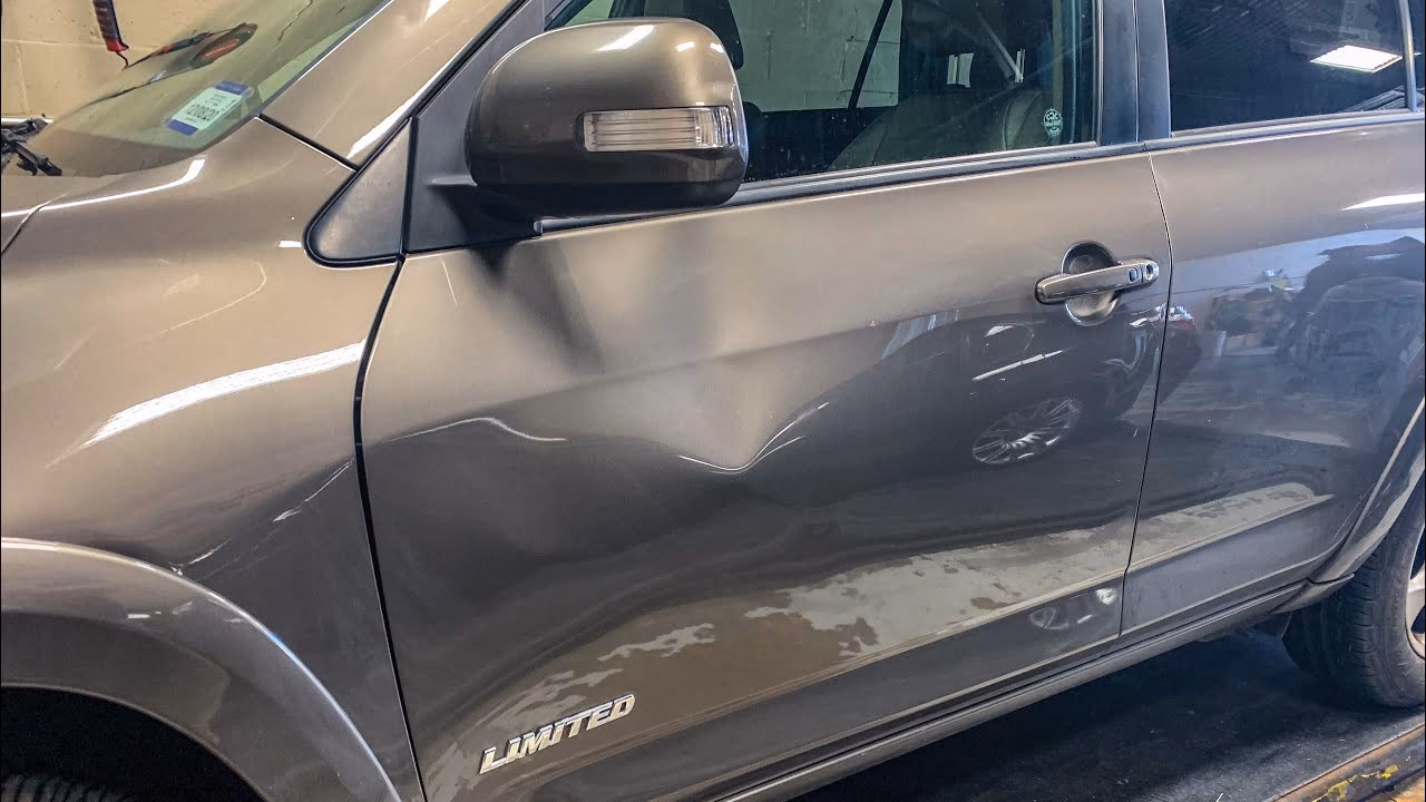 Can a Metal Hammer fix a dent on a car door?