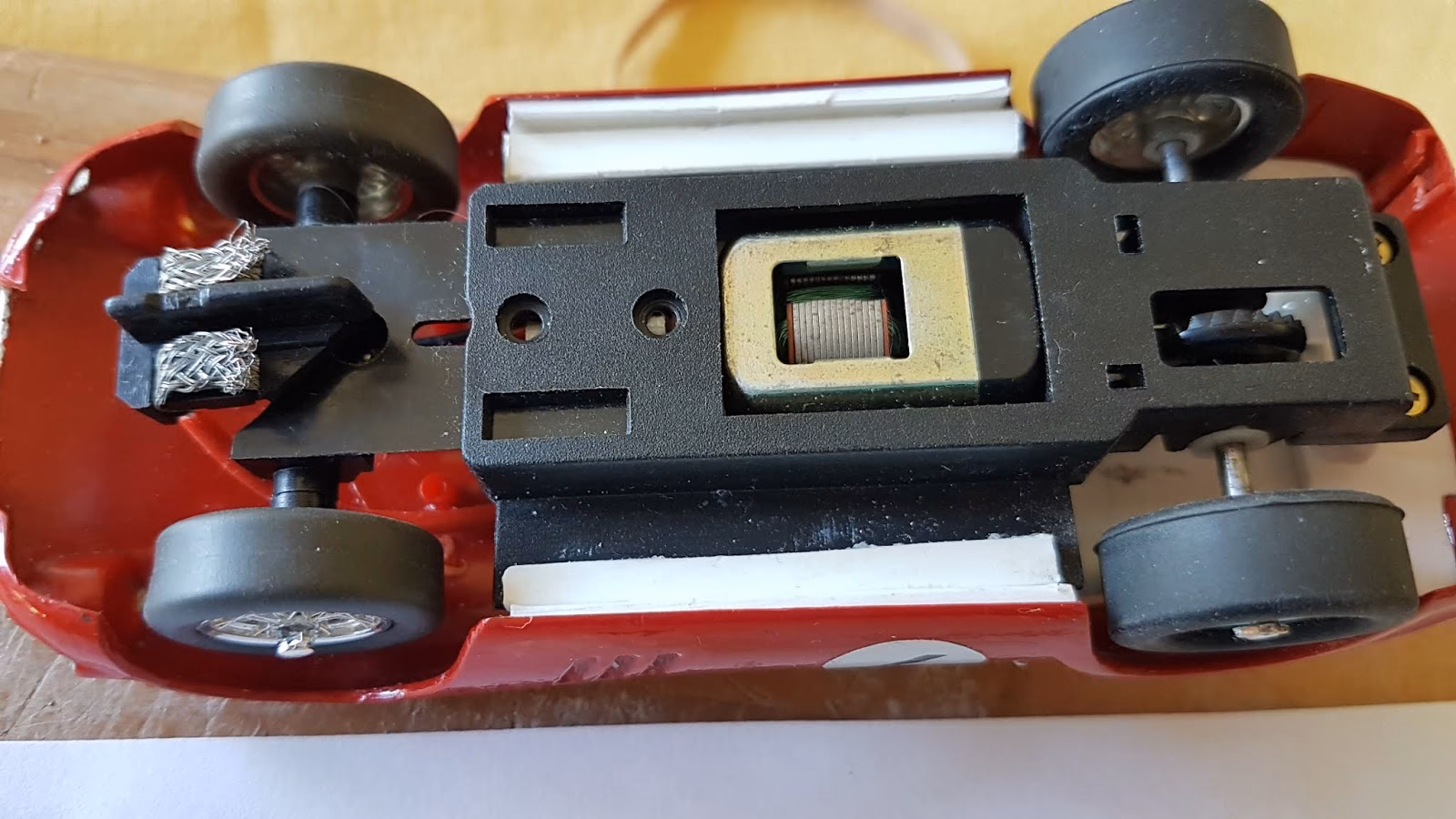 How to improve a classic Scalextric car's performance?