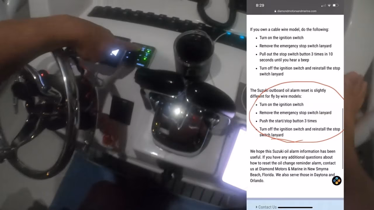 Why is my Suzuki outboard oil warning light on?