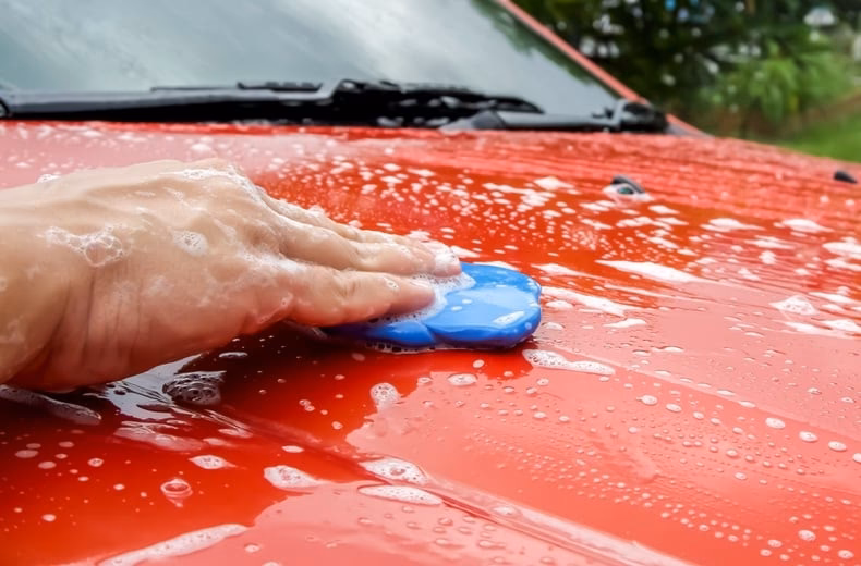 How do you wash a car with a wash Mitt?