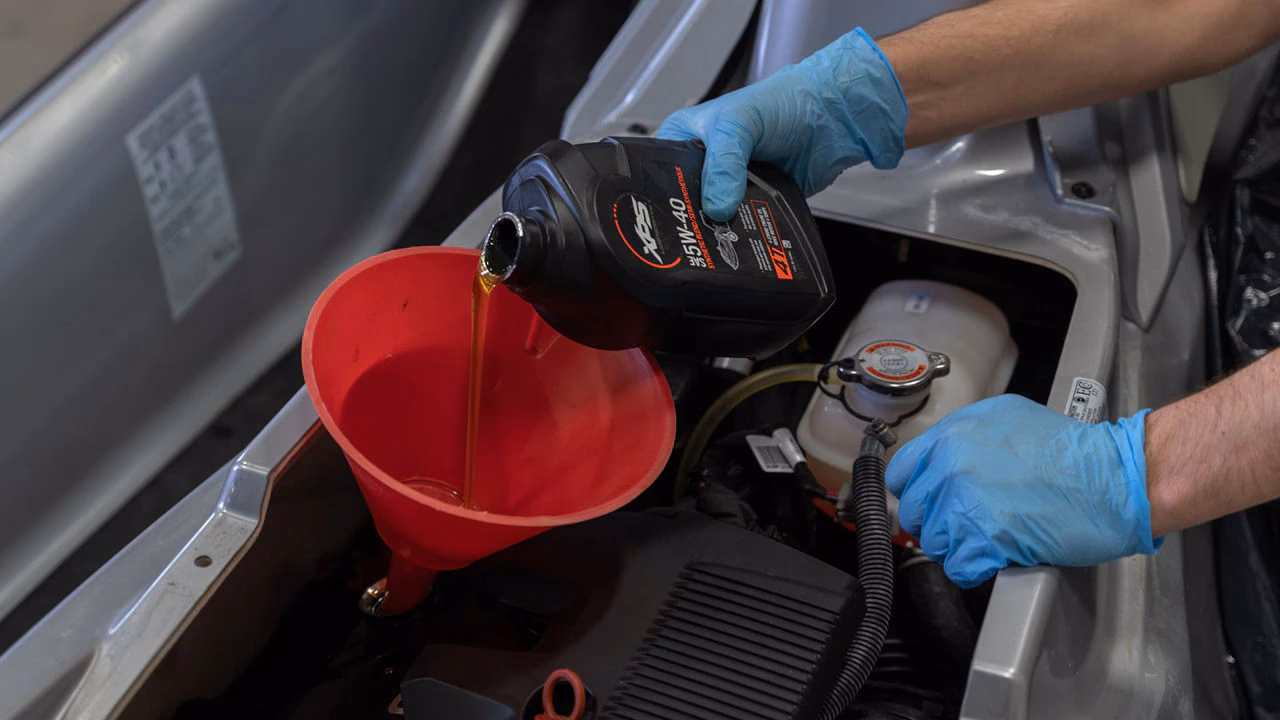 How do you change engine oil on a Sea-Doo?