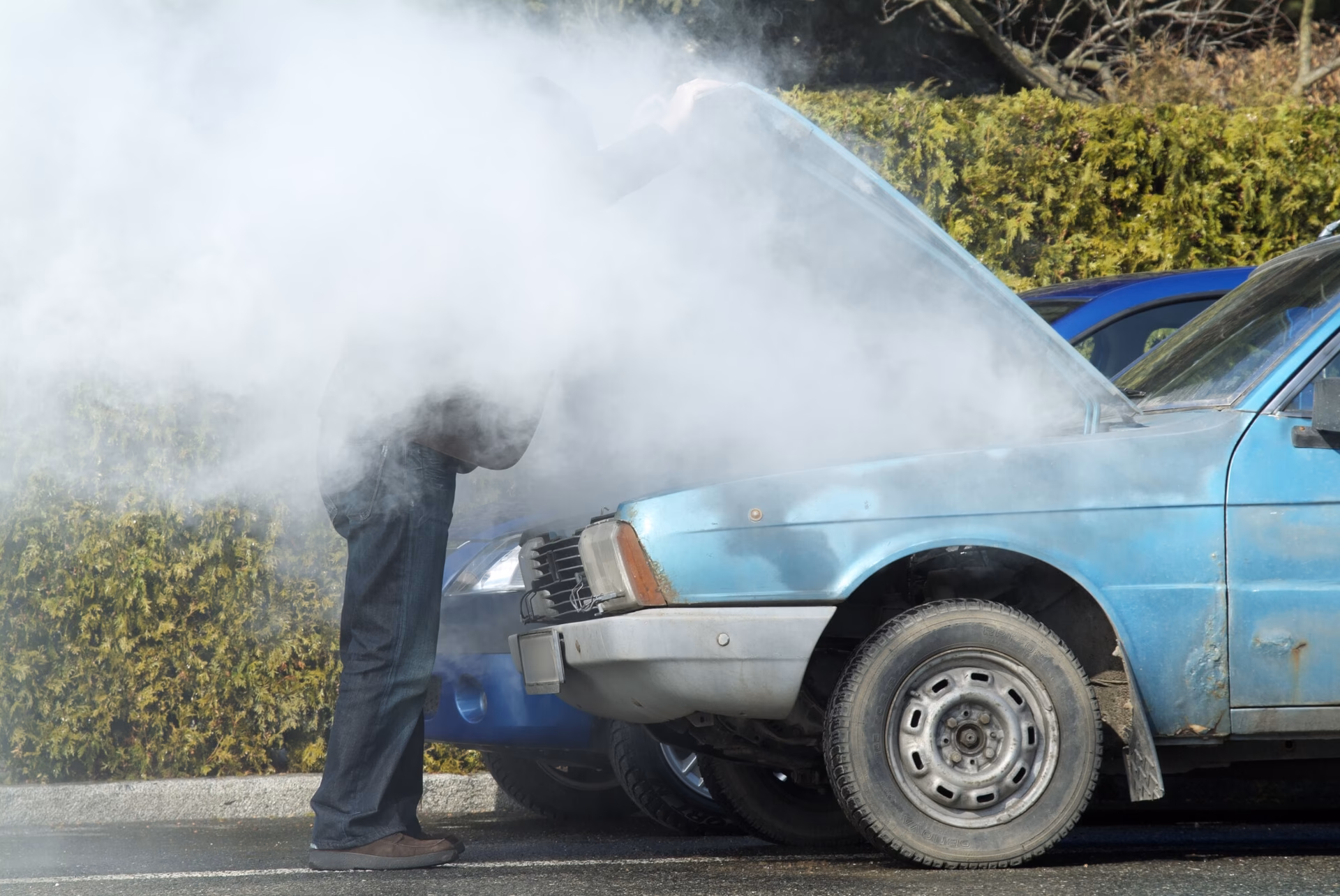 What should I do if my car smokes from the engine bay?