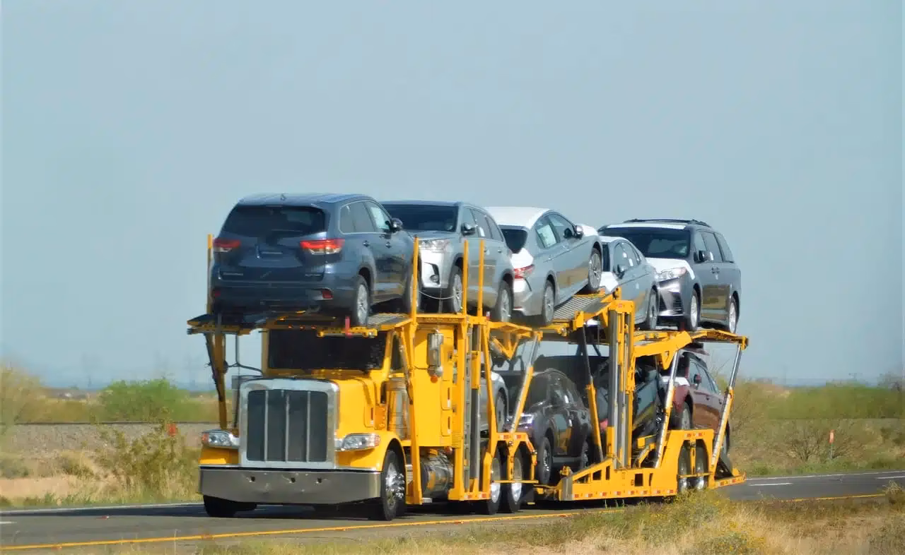 Who must sign a vehicle over to Snowbird auto shipping?
