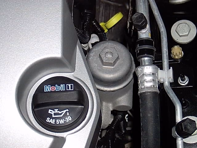 Where is the oil filter located on my SRX?