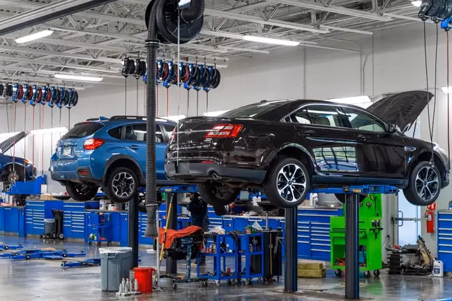 Who performs Subaru maintenance services?