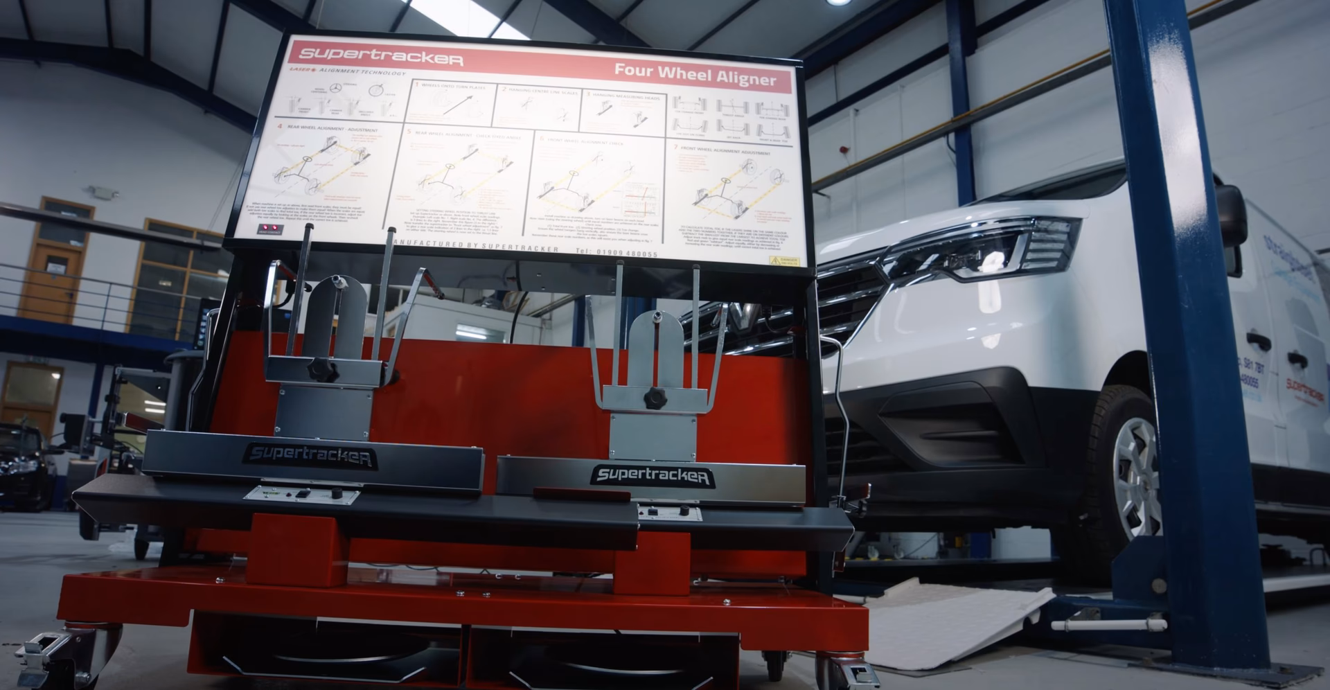 Does SuperTracker offer a laser wheel alignment system with green lasers?