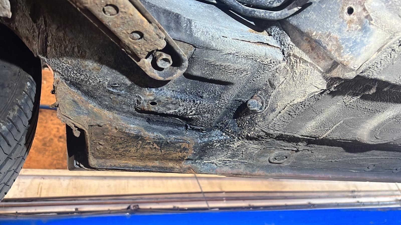 Is suspension component mounting prescribed area corroded?