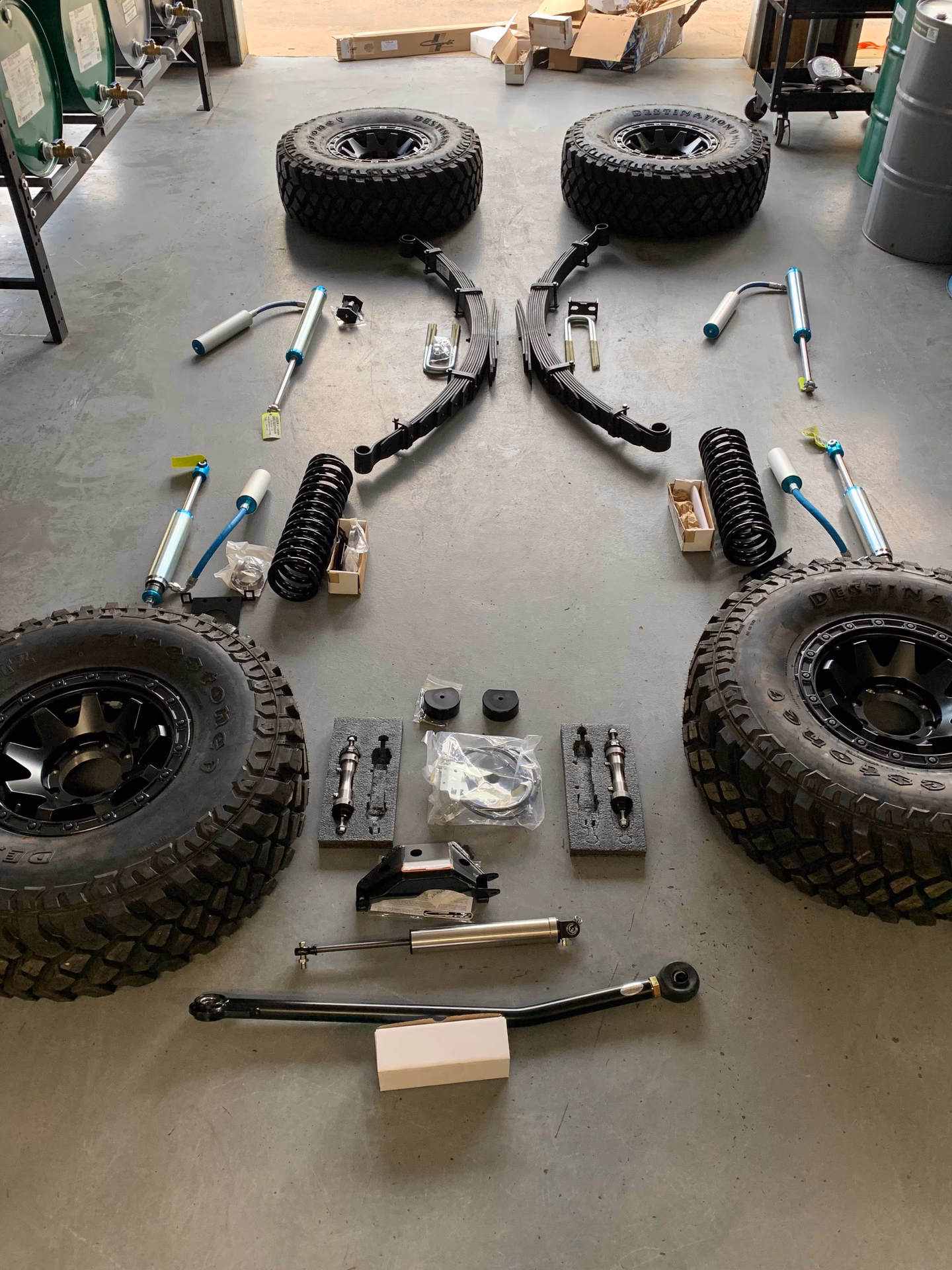Who manufactures suspension springs?