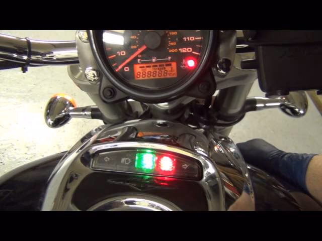 Why is the fuel injection light on my Suzuki XP Fi?