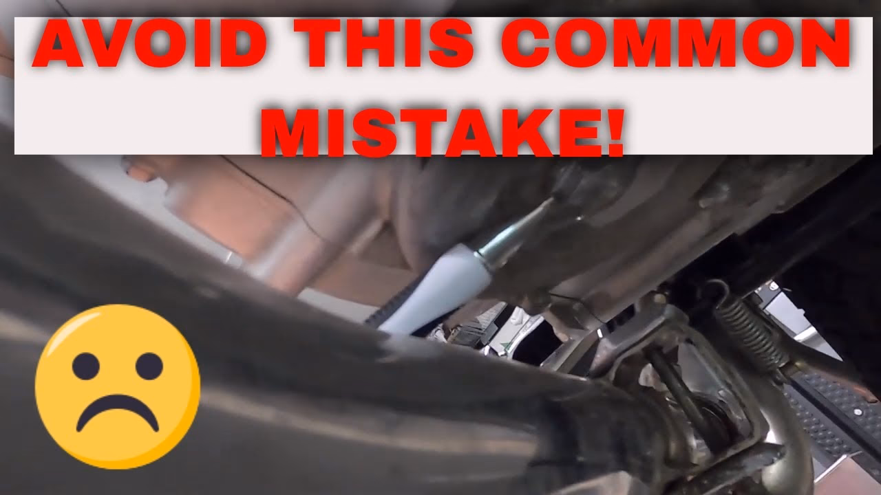 Where is the oil drain plug on a Suzuki TU250X?