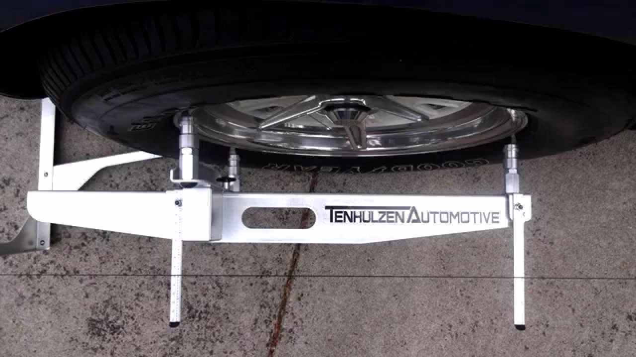 What is a professional 4-wheel alignment system?
