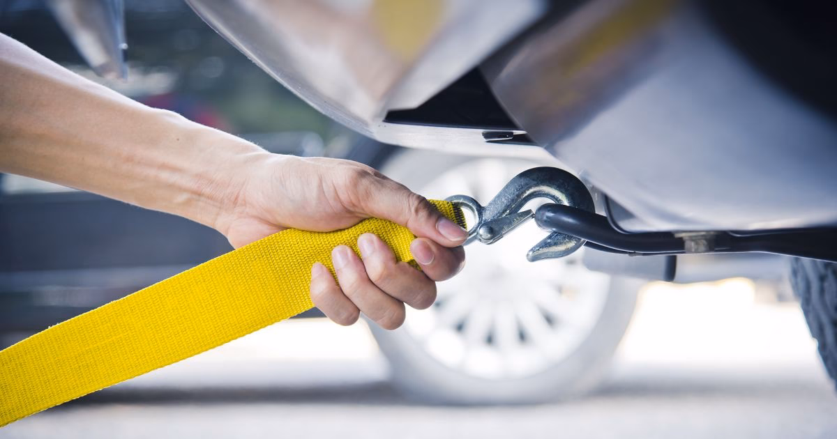 Who is responsible if a car is towed?