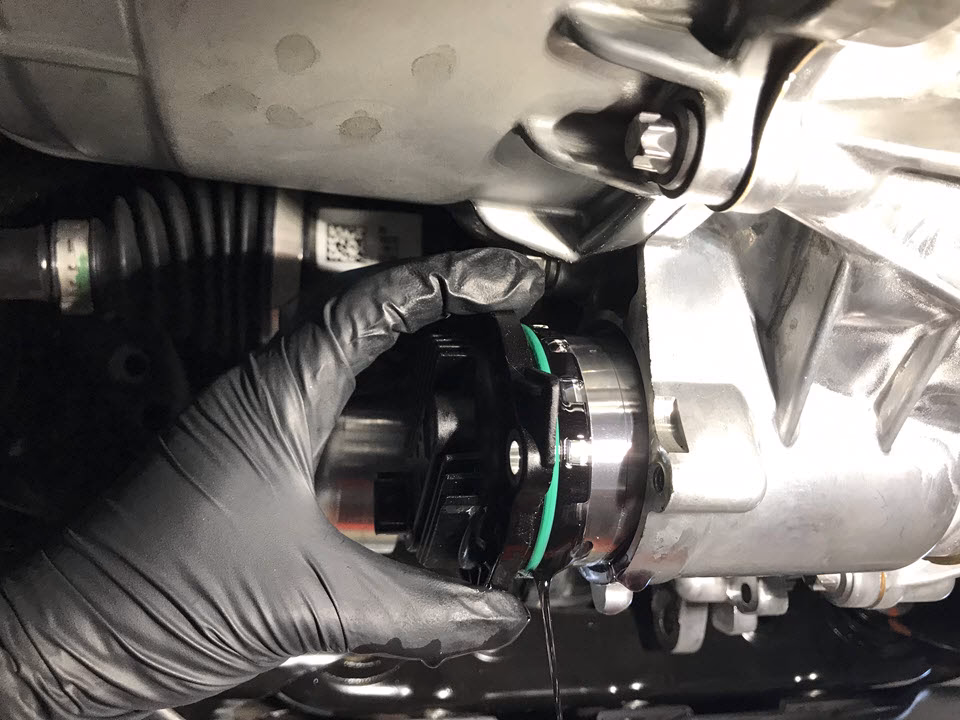 How do you change the oil filter on a Tesla?