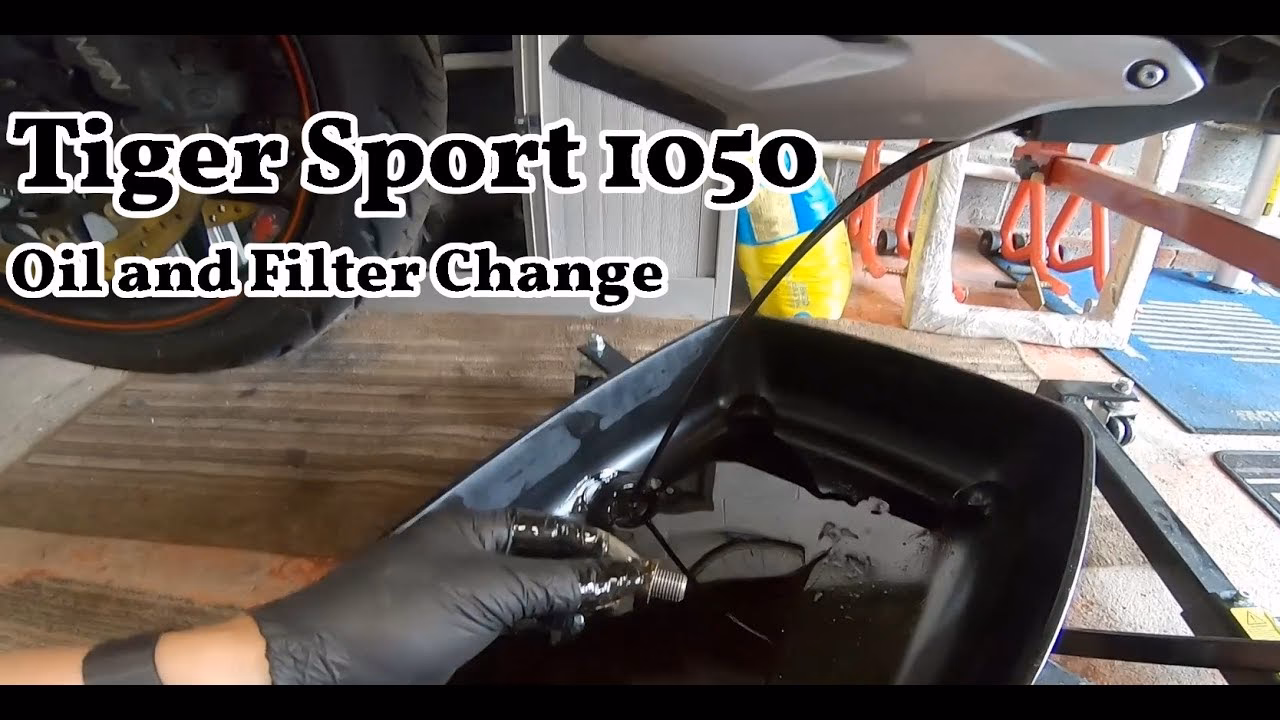 Do you need to remove the tank on a Triumph Tiger 1050?