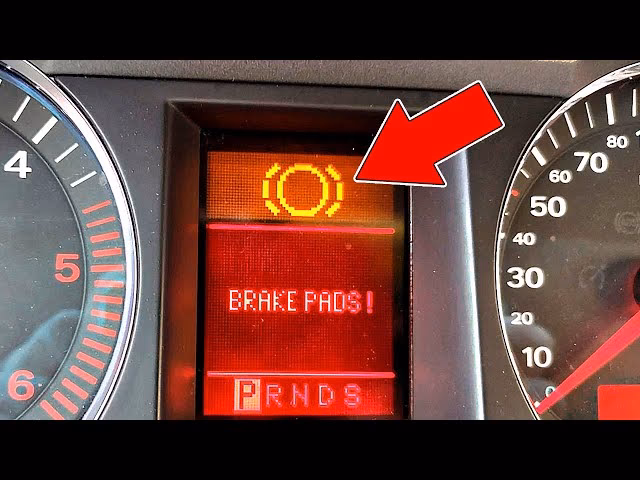 Why is the brake pad wear indicator light on?