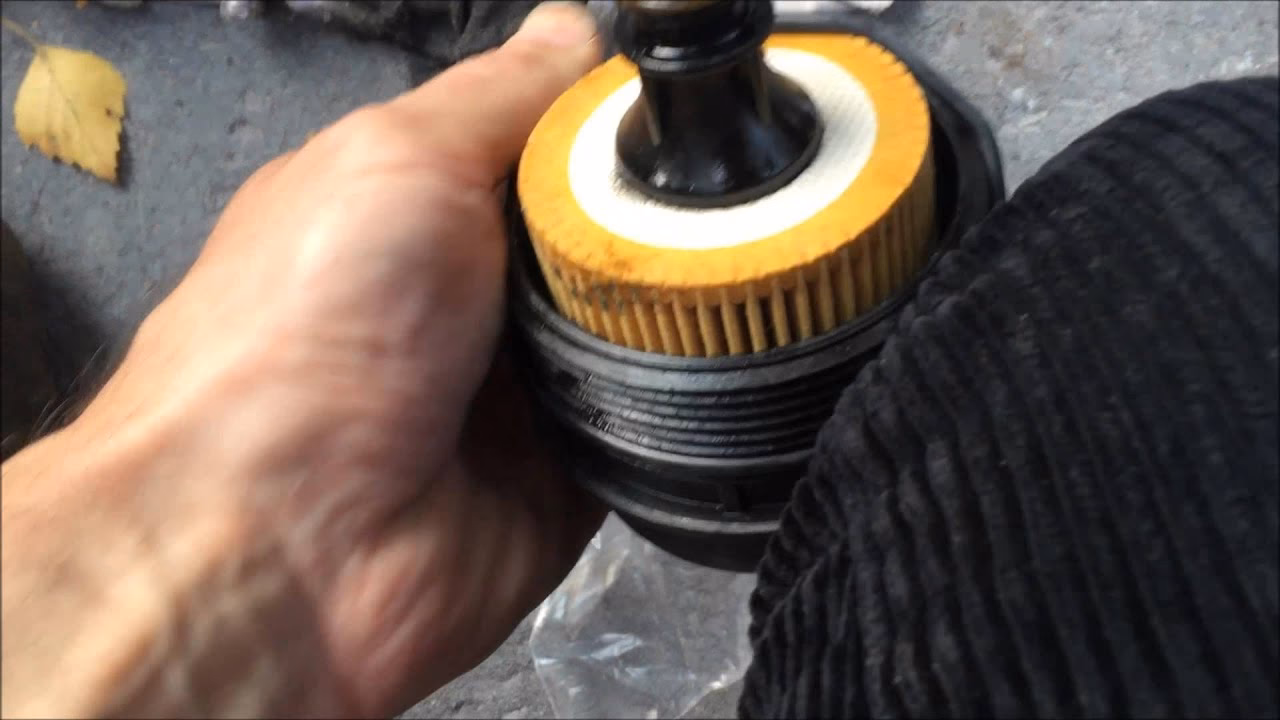 How do you clean an old oil filter?