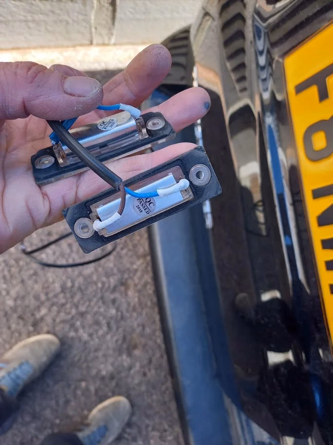 Why is my license plate light bulb not illuminated?