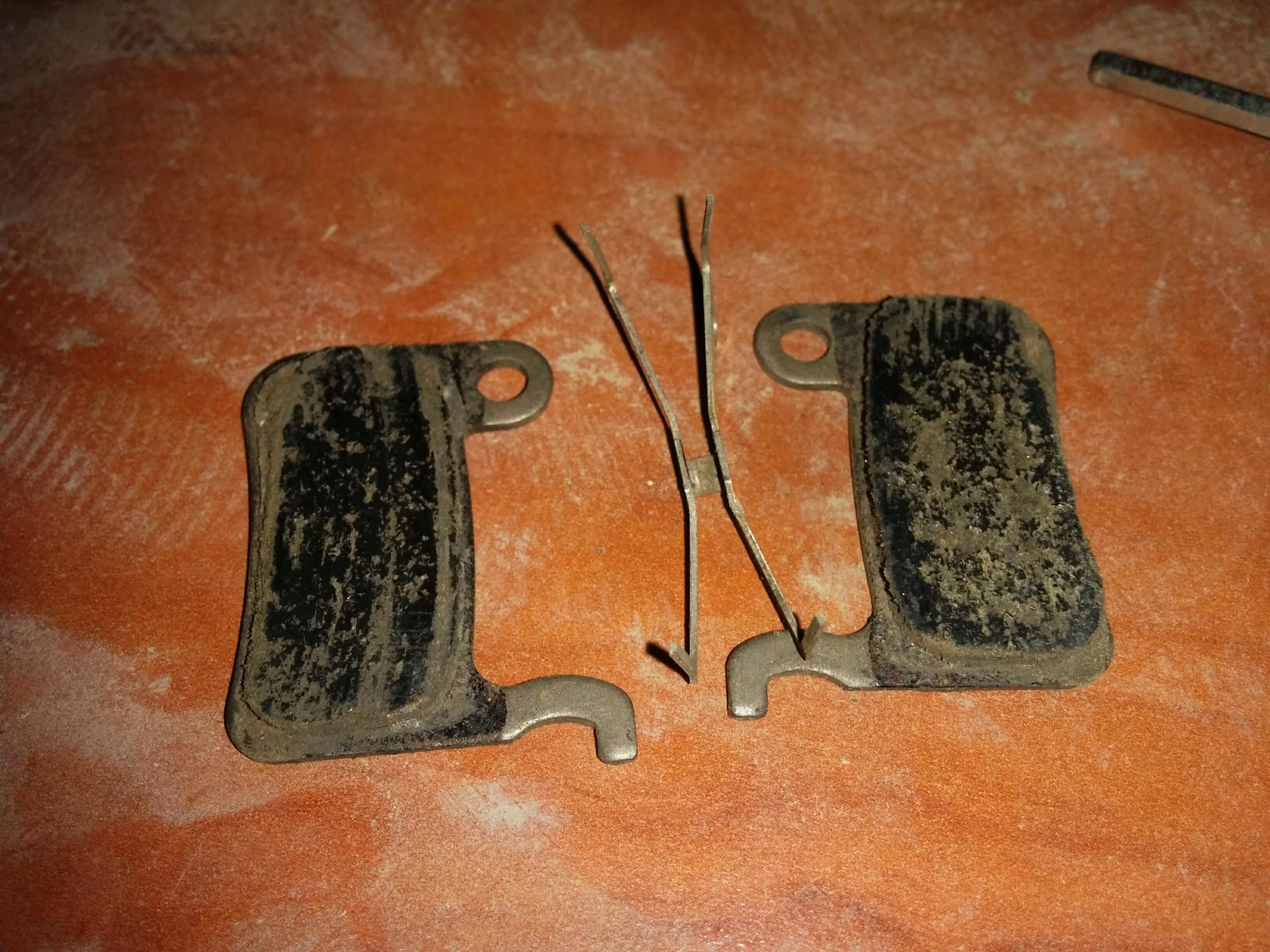 Can a contaminated brake pad be recovered?