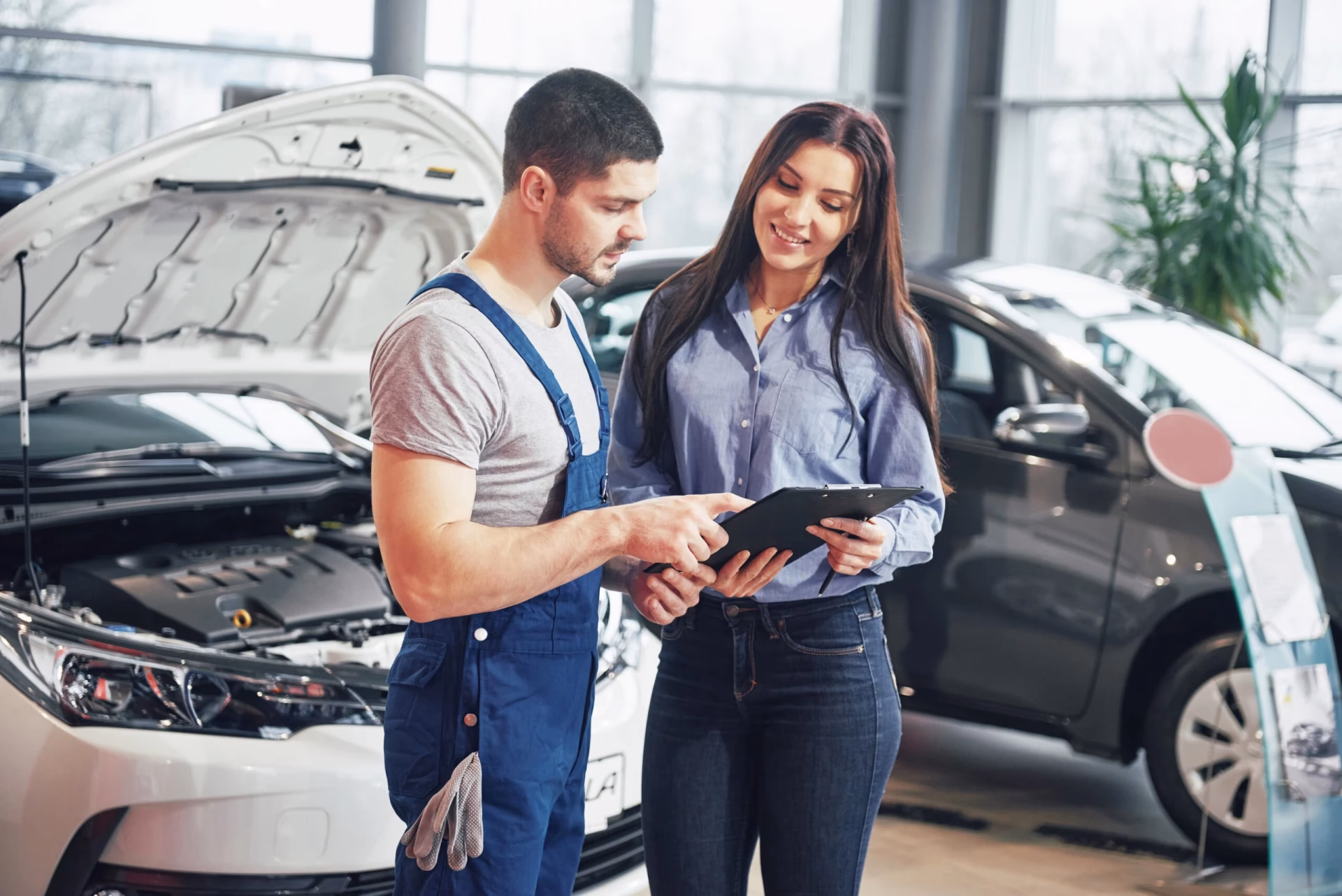 How much does an automotive service writer make?