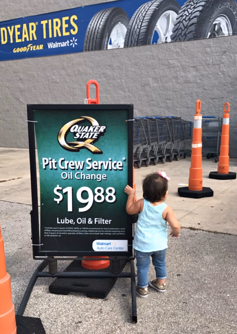 How much does a pit crew oil change cost at Walmart?