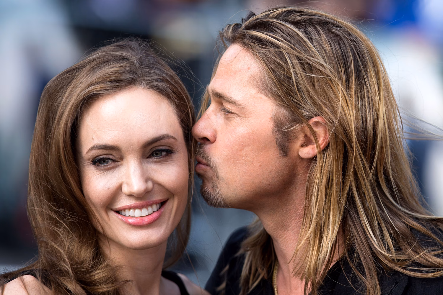 Why do we tilt our faces when we kiss?