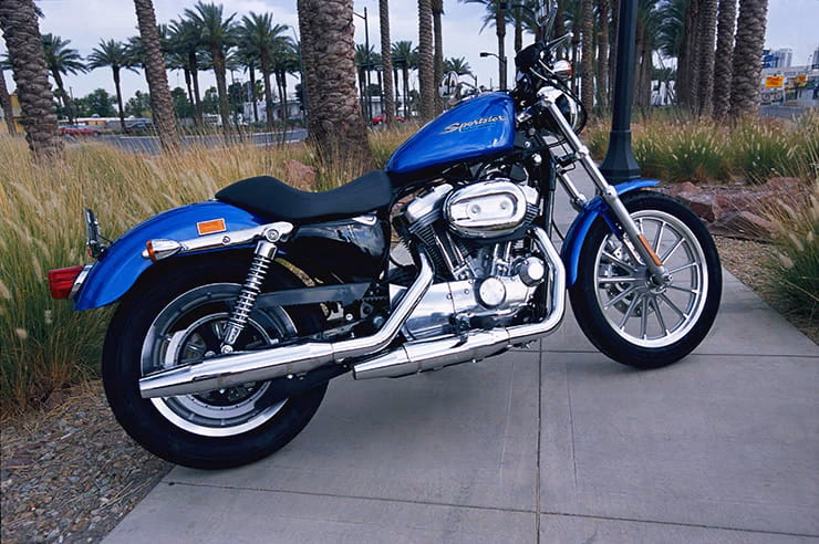 Why did Harley-Davidson switch to fuel injection?