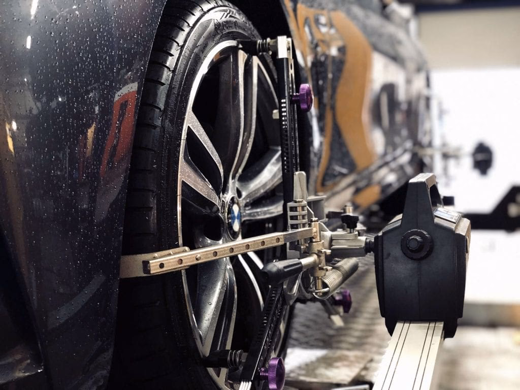 How do I book a tyre alignment at Halfords Autocentre?