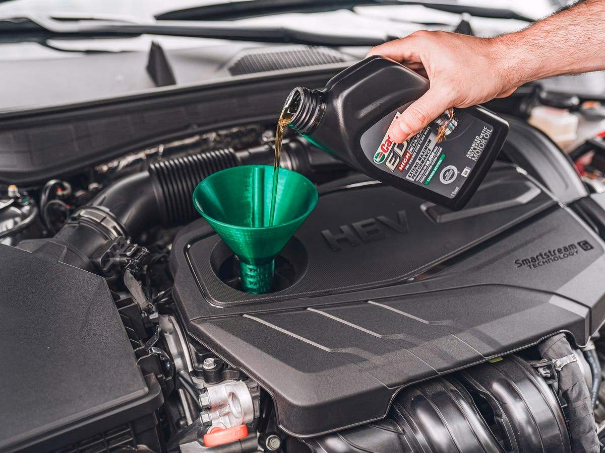 How often should a new car oil be changed?