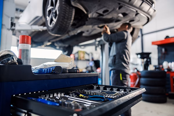 Do I have to service my car at the dealership?