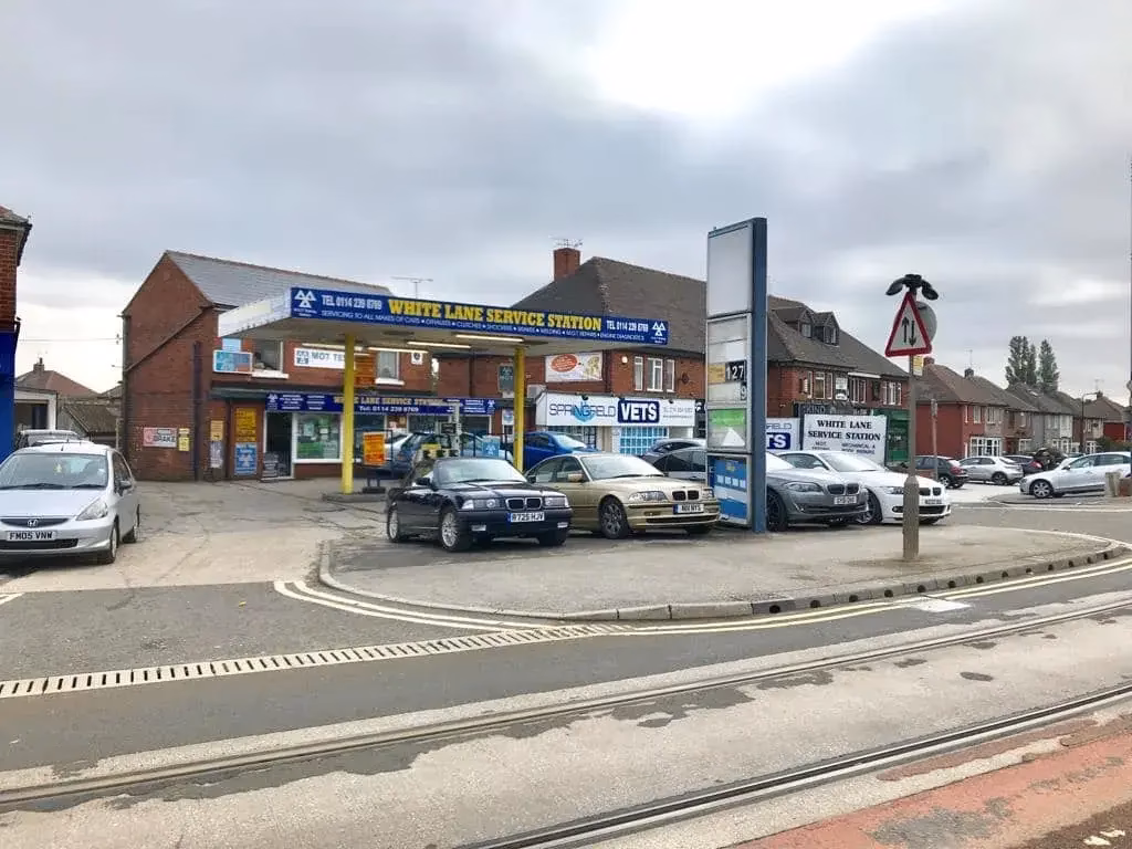 Who is white lane service station?