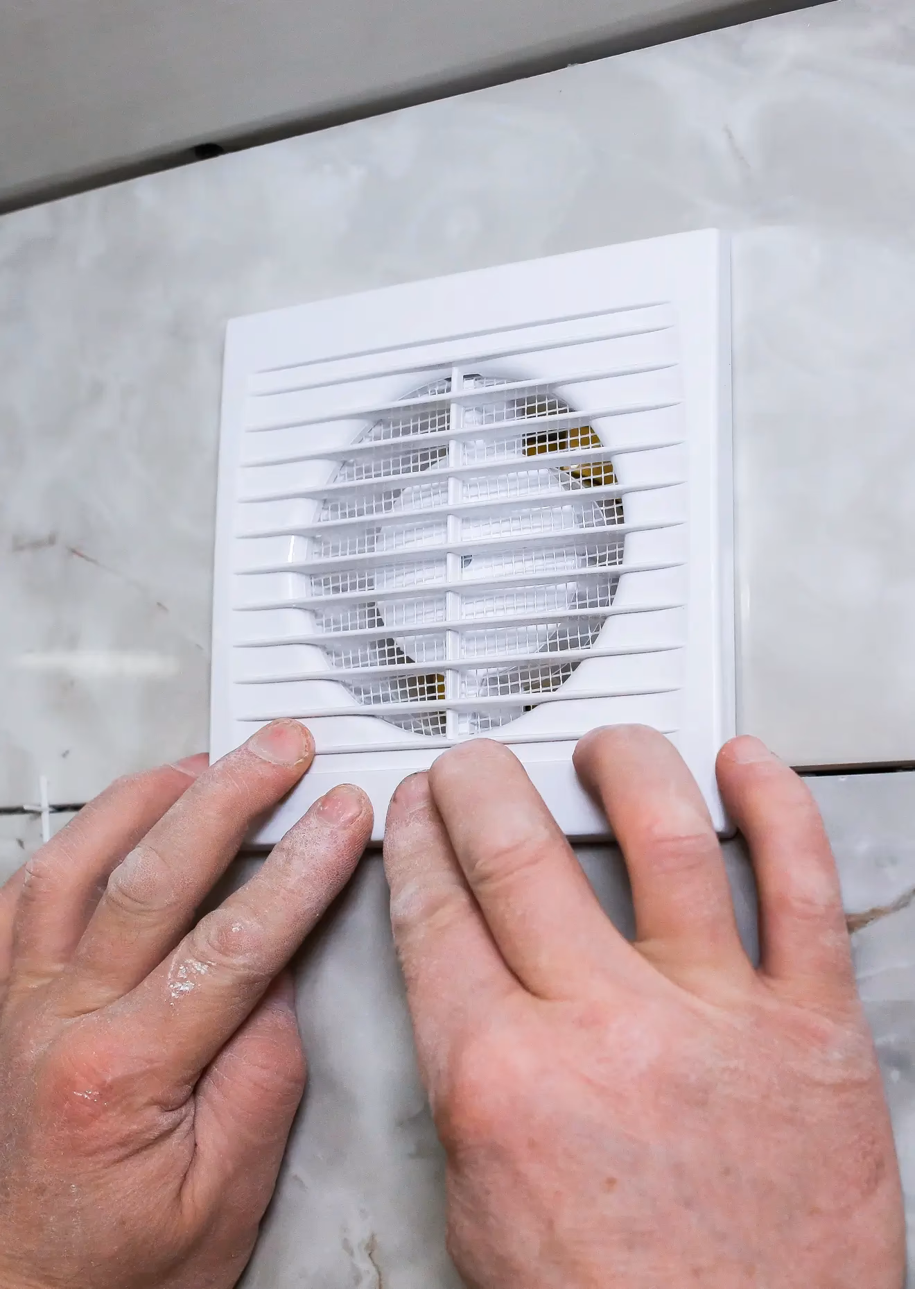 Who can install a bathroom exhaust fan?