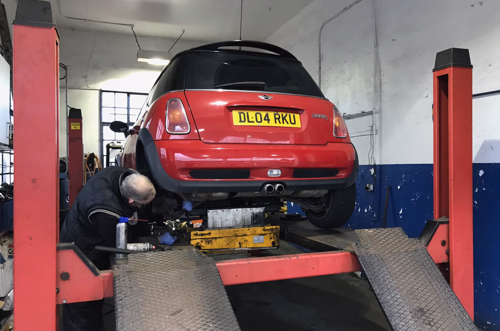 Why is it important to check a car's MOT history?