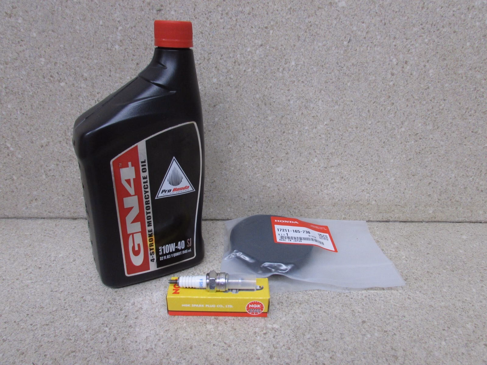 How often should you change engine oil in a Honda XR70R?